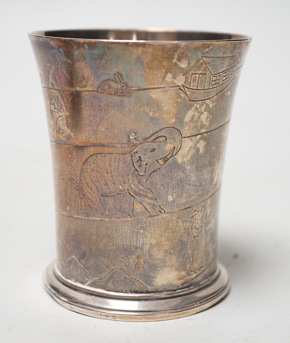 A Harrods silver christening cup decorated with Noah's Ark and animals, Birmingham, 1939, 82mm, 4.5oz.